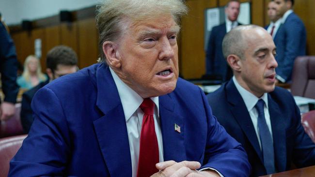 Former US President Donald Trump looks on in the courtroom, during his trial for allegedly covering up hush money payments linked to extramarital affairs, in New York City, on April 30, 2024. (Photo by Eduardo Munoz / POOL / AFP)