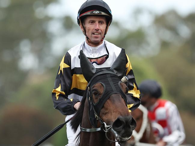 SYDNEY, AUSTRALIA - OCTOBER 12: Nash Rawiller riding Here To Shock wins Race 8 Alan Brown Stakes during Sydney Racing at Rosehill Gardens on October 12, 2024 in Sydney, Australia. (Photo by Jeremy Ng/Getty Images)