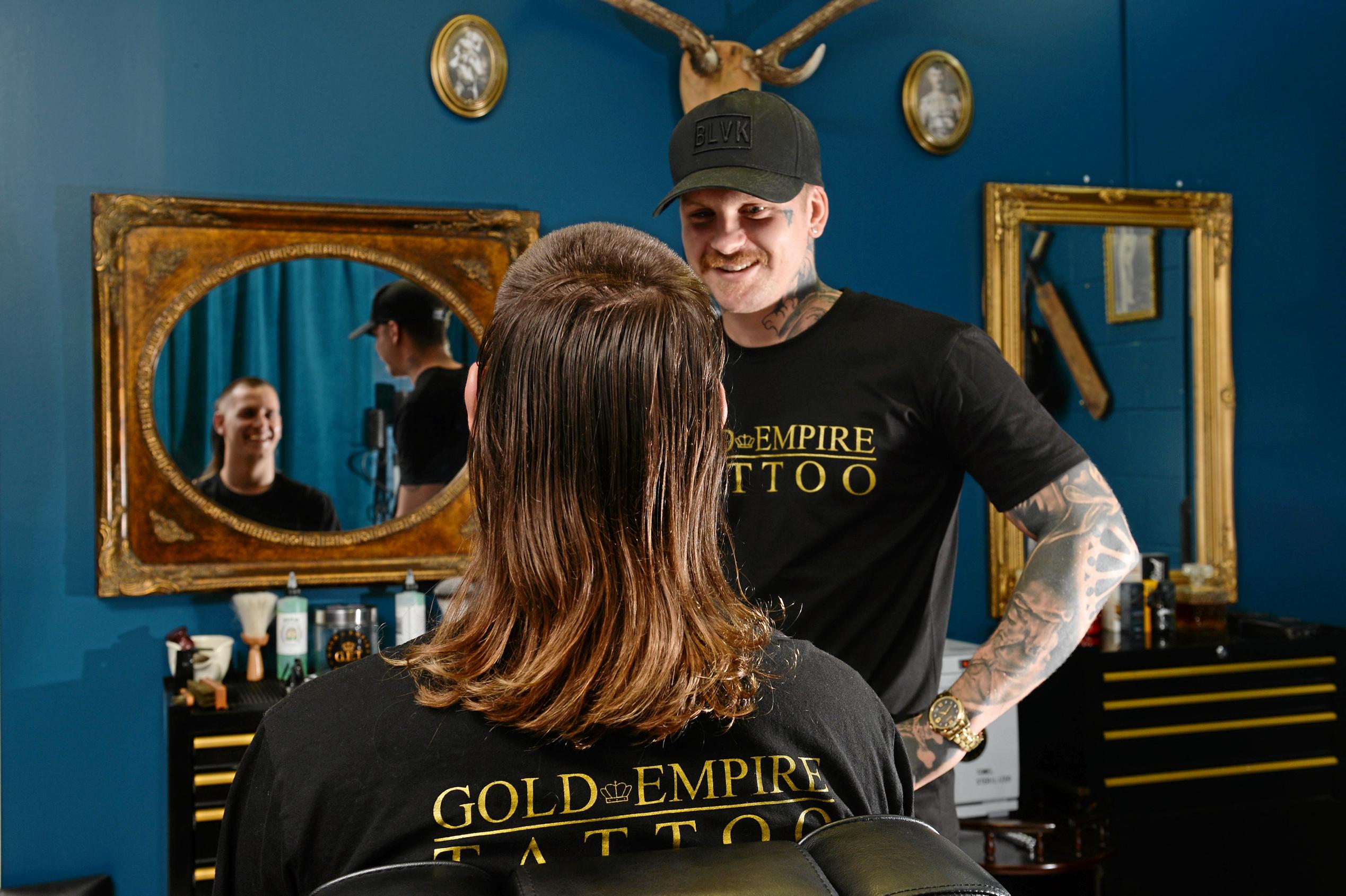 The Mullet is making a comeback in Mackay. Jai Gurr getting his Mullet styled by Andrew Folwell at Gold Empire Tattoo and Hair in Mackay. Picture: Stuart Quinn