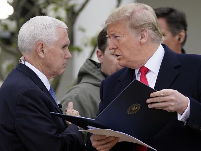 US President Donald Trump with Vice President Mike Pence before a virtual town hall at the White House. Picture: AP