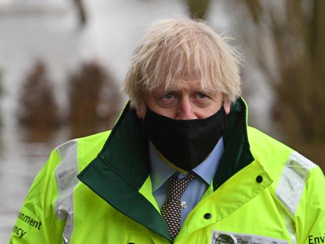 Britain's Prime Minister Boris Johnson said it was “too early” to know when national restrictions would be eased. Picture: AFP