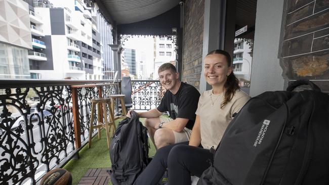 Alex Freeman, 22, and Ella Bromhead, 22, from England came to Adelaide to see the dolphins — which they saw at Glenelg on Wednesday night. Picture: Brett Hartwig