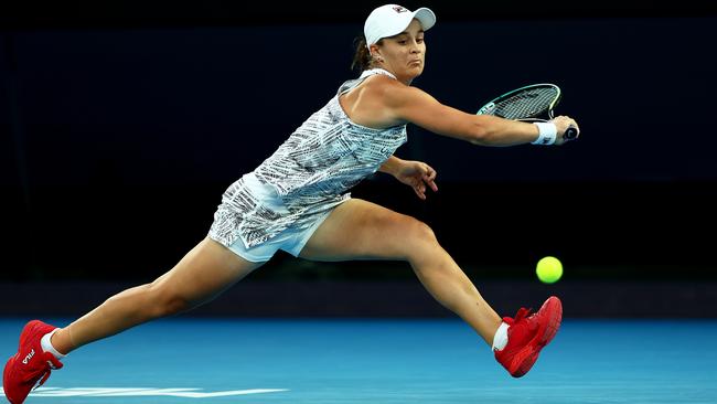 Ash Barty stretches for a backhand on Saturday night. Picture: Getty Images