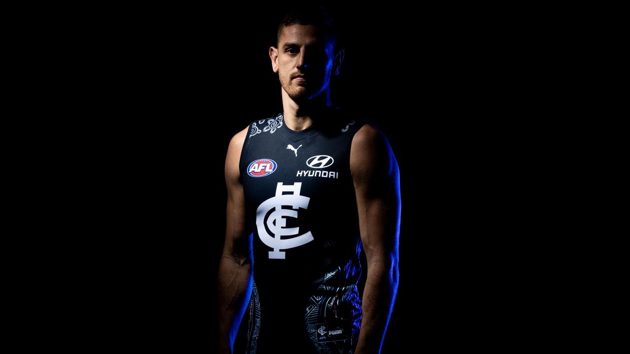 MELBOURNE, AUSTRALIA - MAY 25: Proud Kija man Liam Jones poses during a portrait session in the Carlton Blues 2021 Sir Douglas Nicholls AFL Round Indigenous Jumper designed by proud Gunditjmara Woman Laura Thompson at Ikon Park on May 25, 2021 in Melbourne, Australia. (Photo by Darrian Traynor/Getty Images via AFL Photos)