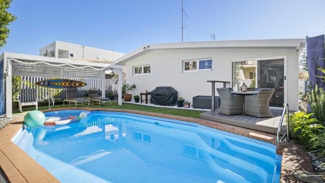 This three-bedroom house on Pine Ave, Surfers Paradise, is available to rent for $1250 a week.