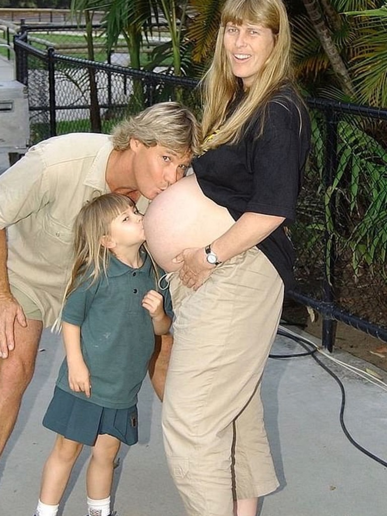 Bindi kissing her mother's belly with her father Steve Irwin. Picture: Instagram