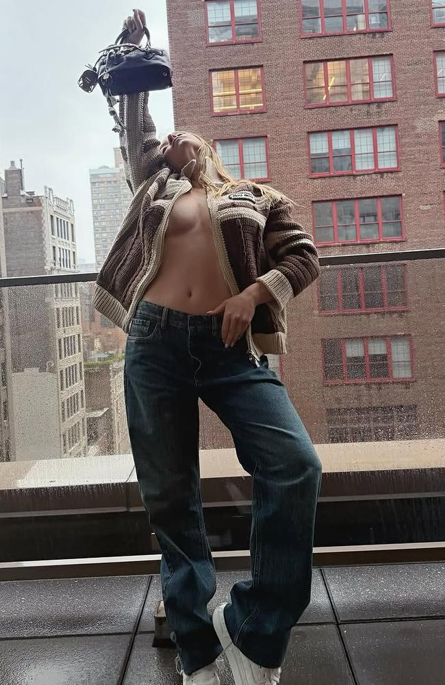 The sexy rooftop snaps come after the actress received foul backlash online over her bikini photos.