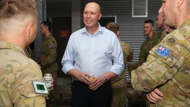 New Defence Minister Peter Dutton speaks with Australian military personnel. Picture: Max Bree