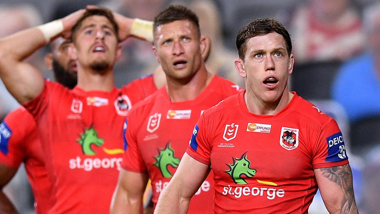 Cameron McInnes of the Dragons (right) reacts after his team conceded a try during the Round 4 NRL match between the Canterbury-Bankstown Bulldogs and the St George Illawarra Dragons at Bankwest Stadium in Sydney, Monday, June 8, 2020. (AAP Image/Dan Himbrechts) NO ARCHIVING, EDITORIAL USE ONLY