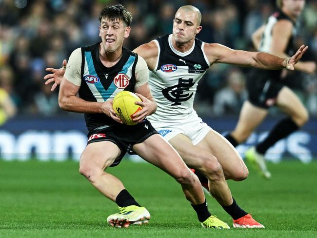 Alex Cincotta barely gave Zak Butters an inch. Picture: Mark Brake/Getty Images