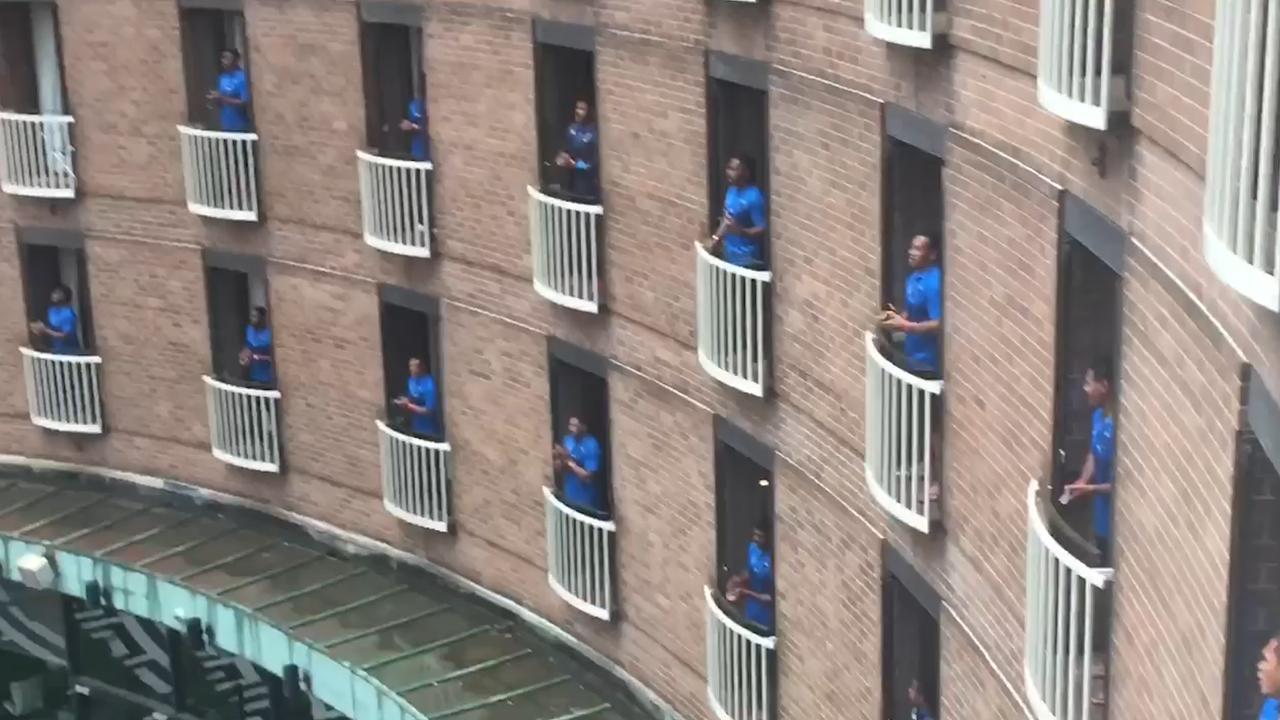 The Fiji Kaiviti Silktails sing to hotel staff to say thank you after their two-week quarantine.