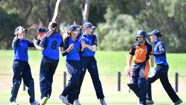 Sturt players celebrate dismissing Northern Districts batter Katie Rowe during their women’s one-day grade cricket semi-final on Saturday. Picture: AAP/Keryn Stevens