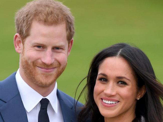 LONDON, ENGLAND - NOVEMBER 27:  Prince Harry and Meghan Markle attend an official photocall to announce the engagement of Prince Harry and actress Meghan Markle at The Sunken Gardens at Kensington Palace on November 27, 2017 in London, England.  Prince Harry and Meghan Markle have been a couple officially since November 2016 and are due to marry in Spring 2018.  (Photo by Karwai Tang/WireImage)