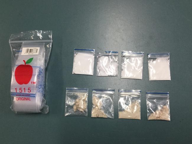 Drugs and cash seized in a raid into a Sippy Downs home by Sunshine Coast Police last night.