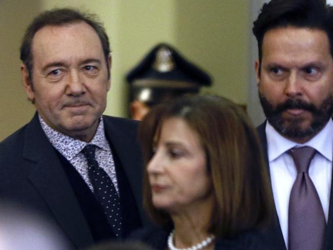 Actor Kevin Spacey enters the courtroom with lawyersJuliane Balliro, front, and Alan Jackson. Picture: AP