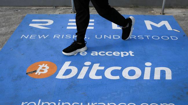 Around 44 per cent of people hold cryptocurrencies, making it the second most held investment type after shares at 74 per cent. Picture: Marco Bello /AFP