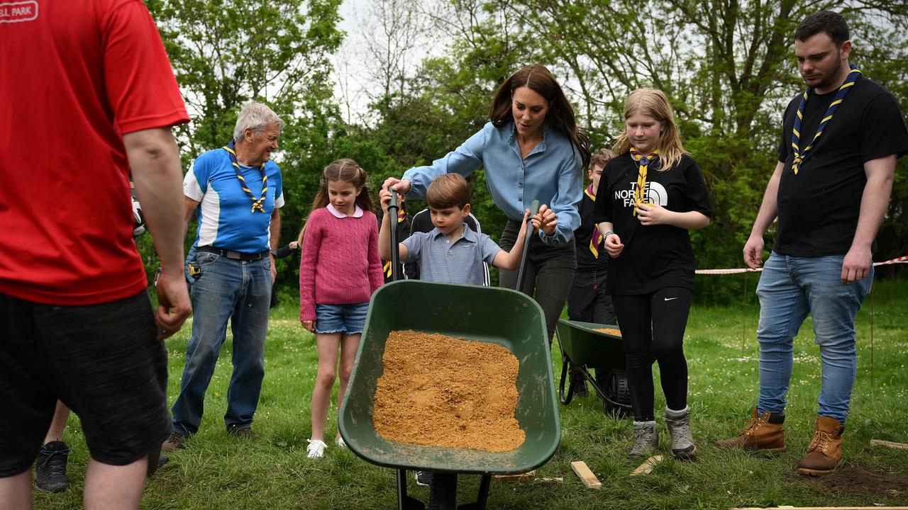 Prince Louis helps his mum in the Big Help Out last year. Picture: Daniel Leal – WPA Pool/Getty Images