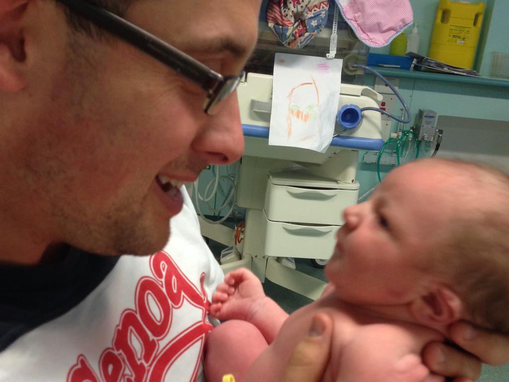 Scott Warren with his firstborn daughter in the NICU. Picture: Supplied