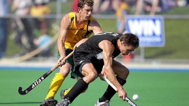 Australia&#39;s Dean Butler (left) and New Zealand&#39;s James Nation (right) in action during their Australia v New Zealand Oceania Cup and Olympic Qualifier finals match in Buderim in 2007. Picture: GRANT TREEBY