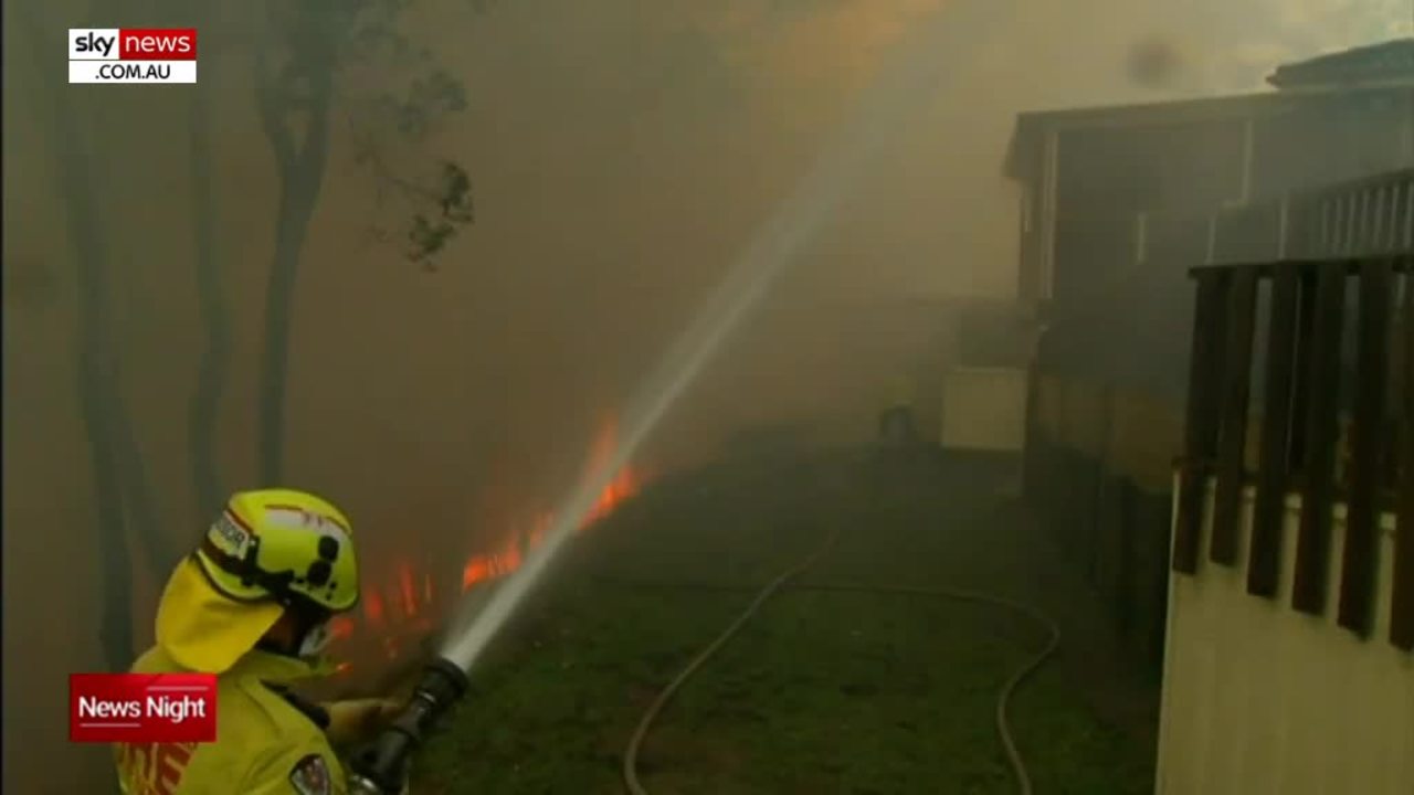 Five emergency warnings, 16 'watch and acts' in NSW as fires rage