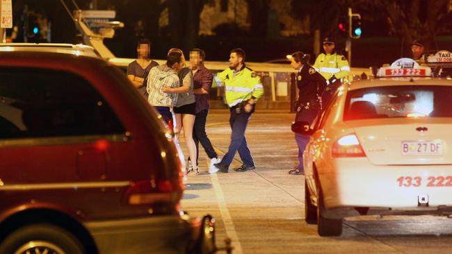 Tasmania Police intervene in an altercation between two groups of people outside nightclub, 'Isobar' on the Hobart waterfront