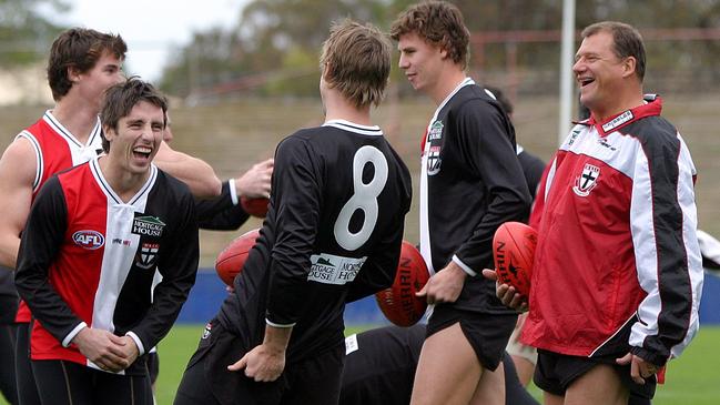 Stephen Milne has a laugh with Max Hudghton and Grant Thomas at St Kilda training.