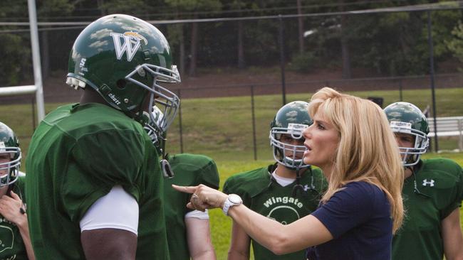 Quinton Aaron as Michael Oher and Sandra Bullock as Leigh Anne Tuohy in a scene from 2010 film 'The Blind Side'