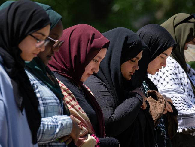 Pro-Palestinian students and activists pray at the encampment on the campus of George Washington University in Washington, DC. Picture: AFP