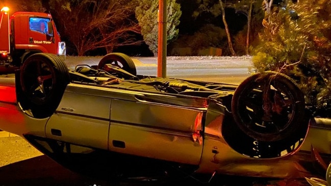 A Holden sedan rolled and crashed at Greenwith overnight. Picture: Supplied/SA Police