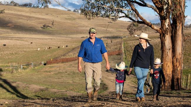 Glen O'Brien, his wife Philippa and family on their farm at Walcha, NSW. Picture: supplied