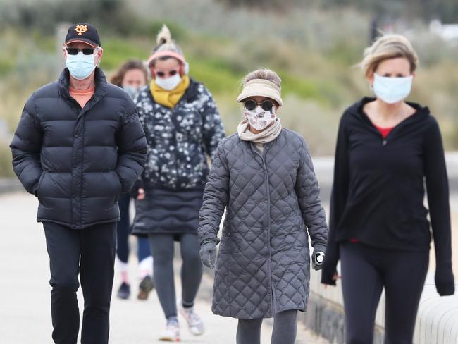 People exercising in Melbourne on Monday. Picture: David Crosling