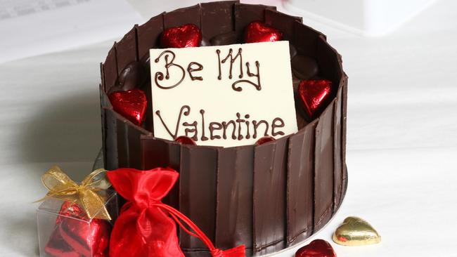 Bake or buy a special dessert for your Valentine like this delicious mud cake with shards and hearts.