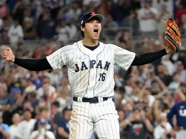 MIAMI, FLORIDA - MARCH 21: Shohei Ohtani #16 of Team Japan reacts after the final out of the World Baseball Classic Championship defeating Team USA 3-2 at loanDepot park on March 21, 2023 in Miami, Florida. (Photo by Eric Espada/Getty Images)