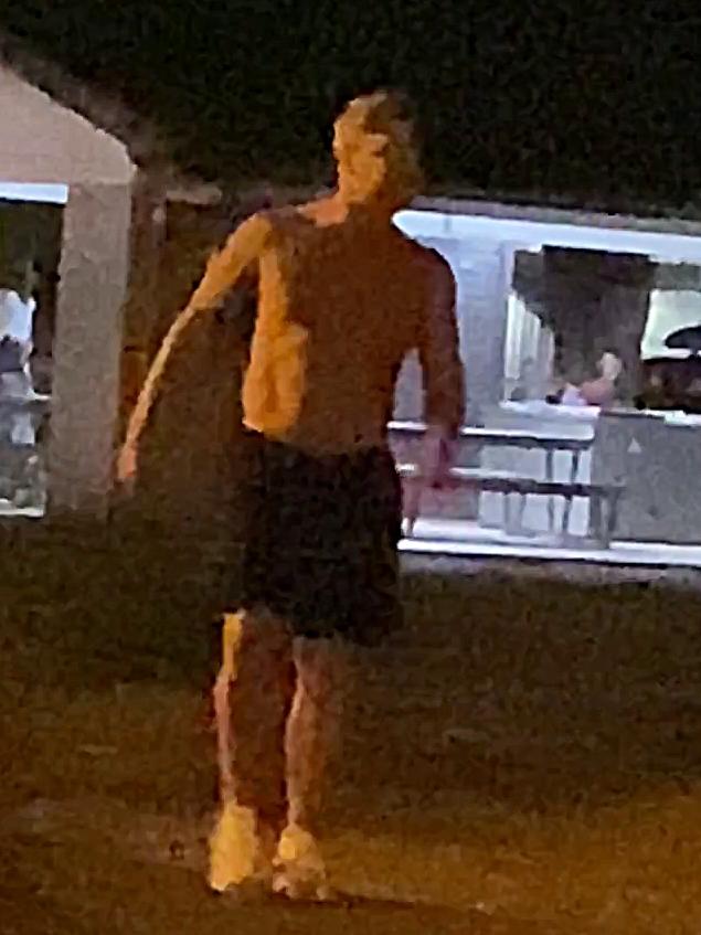 A shirtless Clarke in the Noosa park.