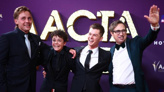 Boy Swallows Universe cast members Lee Halley, Felix Cameron and Zac Burgess and writer Trent Dalton at the 2025 AACTA Awards on the Gold Coast. Picture: Getty Images for AFI