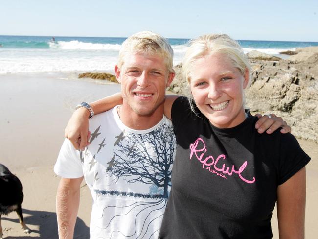 The newest Cooly Kid, Roxy Pro winner Stephanie Gilmore, celebrates with Quiksilver Pro winner Mick Fanning at Snapper Rocks. PicDavid/Clark