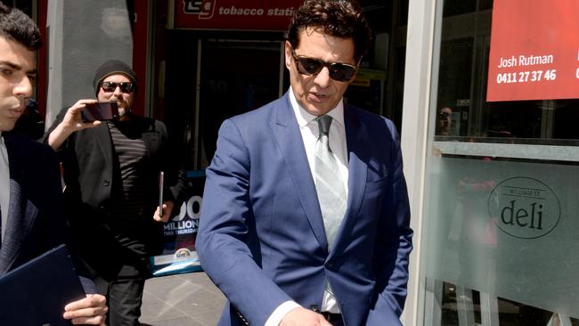 Vince Colosimo leaves the Melbourne Magistrates' Court.