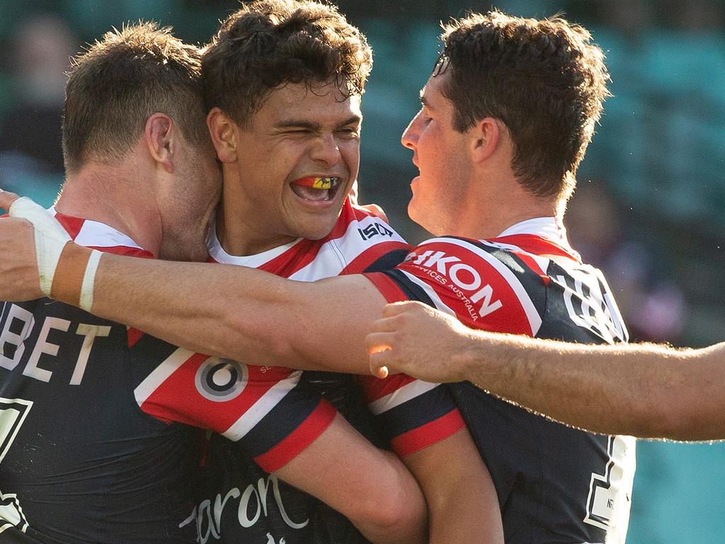 Latrell Mitchell of the Roosters reacts to scoring a try during the Round 22 NRL match between the Sydney Roosters and the New Zealand Warriors at the SCG in Sydney, Sunday, August 18, 2019. (AAP Image/Steve Christo) NO ARCHIVING, EDITORIAL USE ONLY