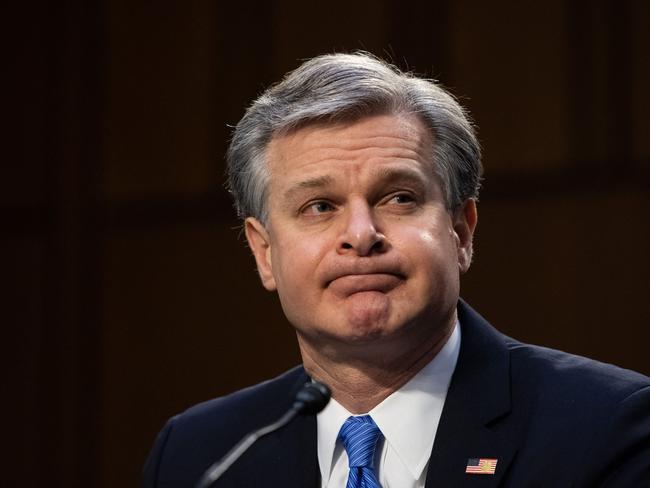 (FILES) FBI Director Christopher Wray testifies before the Senate Judiciary Committee on the January 6th insurrection, in the Hart Senate Office Building on Capitol Hill in Washington, DC on March 2, 2021. FBI Director Christopher Wray informed bureau employees on December 11, 2024, that he plans to resign in January, US media reported. President-elect Donald Trump has announced the nomination of staunch loyalist Kash Patel to replace Wray as the head of the FBI. (Photo by Graeme Jennings / POOL / AFP)