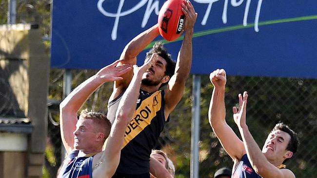 Terry Milera takes a screamer in the second quarter. Picture: Mark Brake.