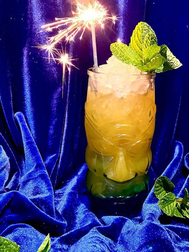 Brass Razu’s Mango Django is served with a lit sparkler.