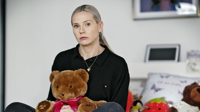 **** WARNING ****MUST NOT PUBLISH UNTIL SUNDAY 17 NOV ***DAILY TELEGRAPH - 13/11/24Kelly OÃBrien pictured sitting on her late daughter CharlotteÃs bed, holding ÃCharlie BearÃ which houses her late CharlotteÃs ashes.  Picture: Sam Ruttyn