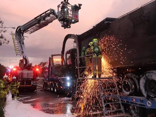 Fire crews are working to confirm the cause of a dramatic garbage truck fire on the M7 Motorway at Horsley Park on January 21 at 6.15pm.