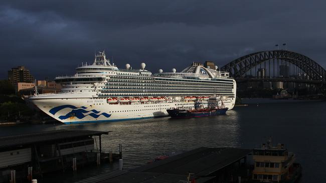 The Ruby Princess docks at Sydney’s Overseas Passenger Terminal in 2020 at a time the world imposed travel bans and extra health screening measures to contain the spread of the coronavirus. Picture: Lisa Maree Williams