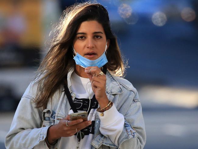 SYDNEY, AUSTRALIA - NewsWire Photos AUGUST 06, 2021 - A woman with a mask in Sydney.Picture: NCA NewsWire / Christian Gilles