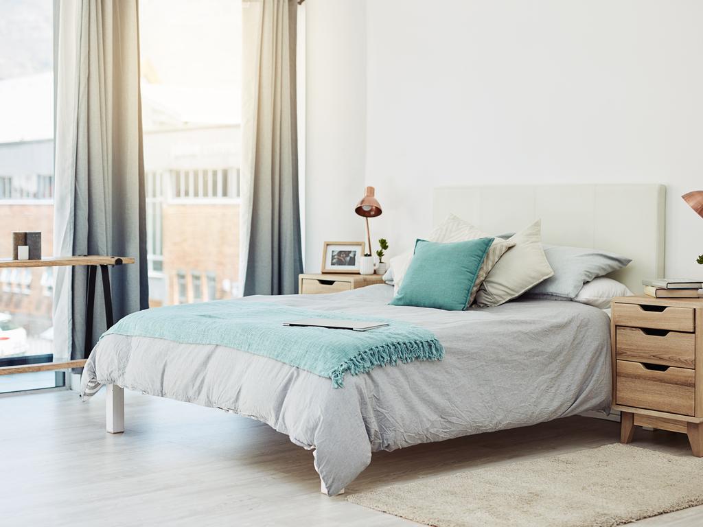 If you want your bed to look neater, move the pillows off of the quilt. Picture: iStock