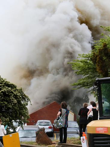 Smoke billows from the fire at the Peacock Centre. Picture: SAM ROSEWARNE.