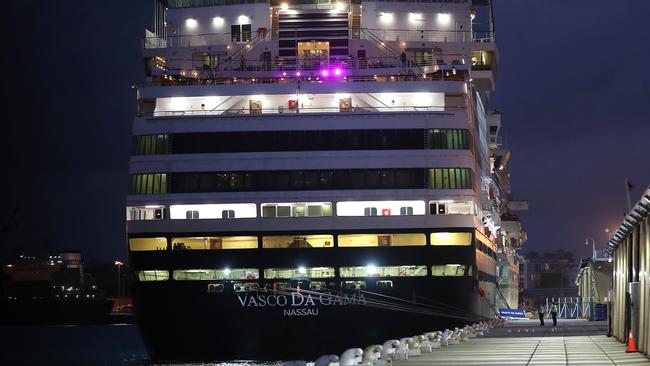 Police officers keep watch of the Vasco Da Gama cruise ship while berthed at the Fremantle Passenger Terminal on March 27.