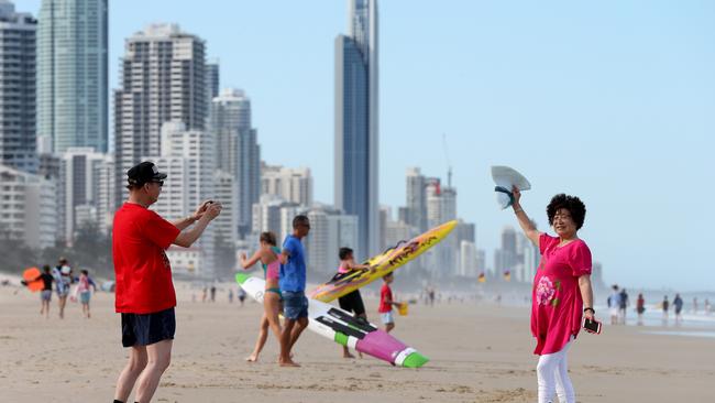 Chinese Tourists pictured on BroadBeach. Picture Mike Batterham