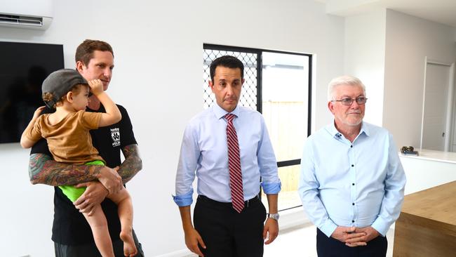 Premier David Crisafulli visits a new housing development at Bentley Park, Cairns with Mulgrave MP Terry James and spoke with first homebuyer Aidan Maxwell and son Harry. Picture: Peter Carruthers